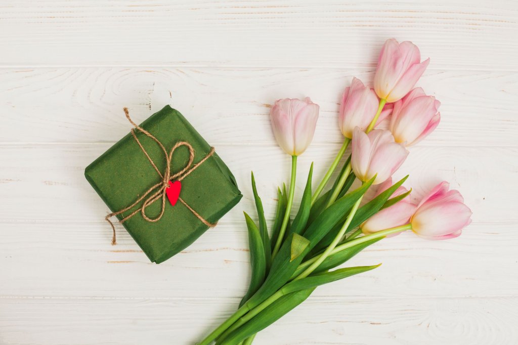 flowers-gift-box-white-wooden-table.jpg