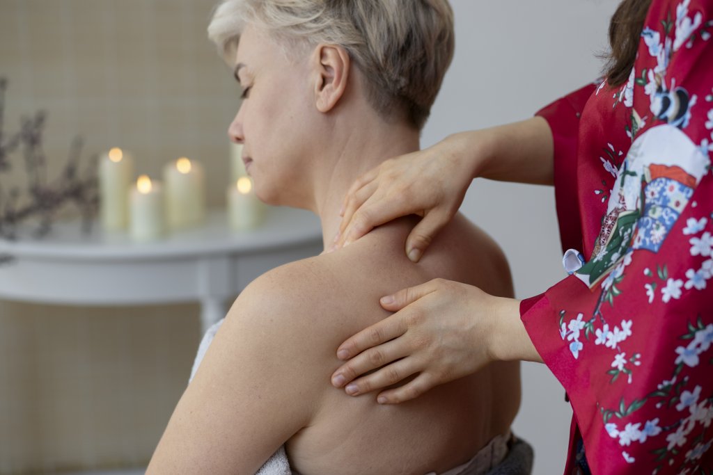 side-view-hands-massaging-woman-s-back.jpg