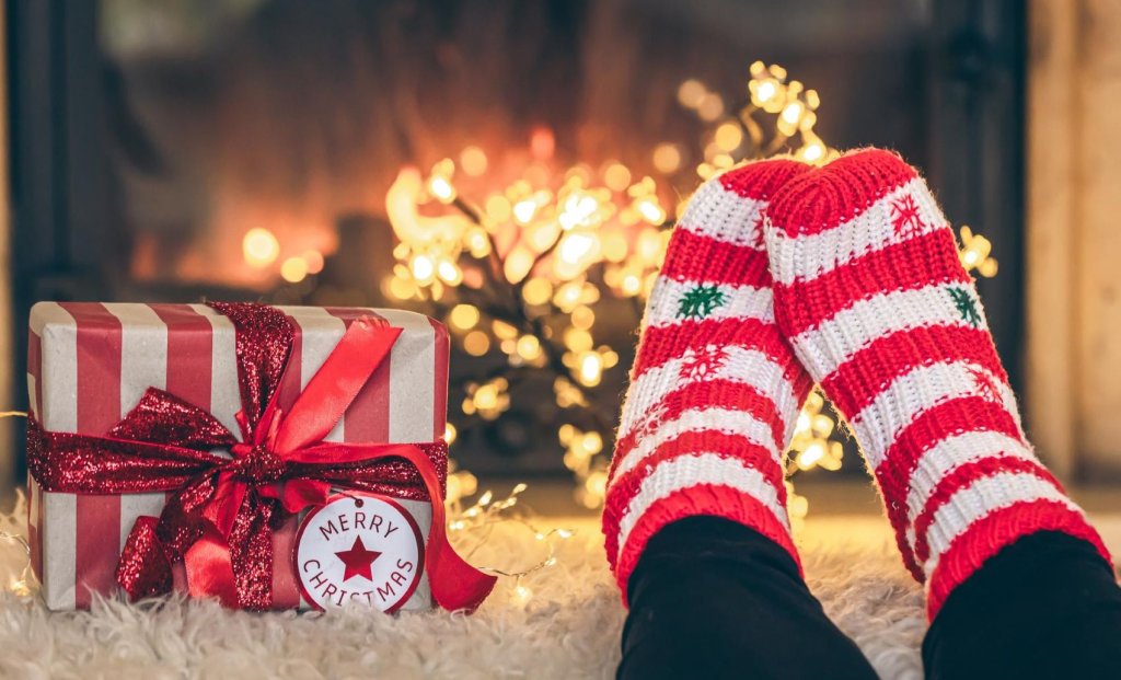 feet-christmas-socks-gift-box-front-fireplace-closeup.jpg