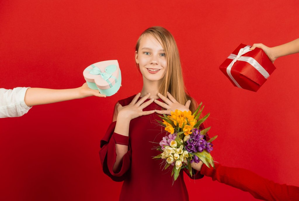 teenage-girl-receiving-lots-gifts.jpg