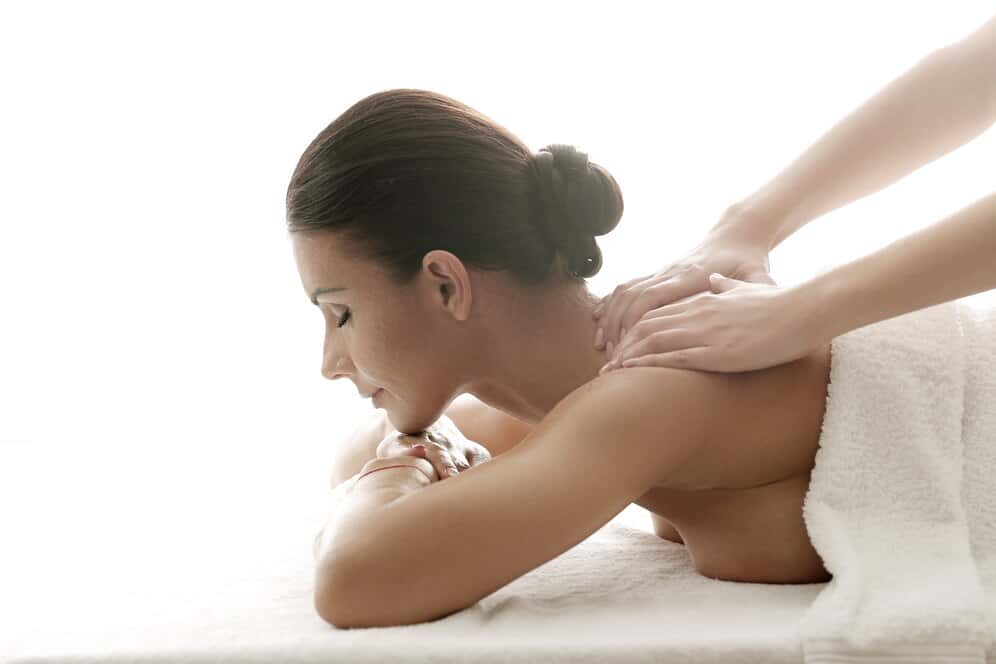woman-receiving-relaxing-massage-spa_144627-33154.jpg